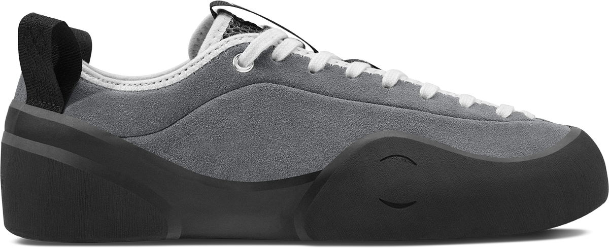 side view of grey suede climbing style skateboard shoe