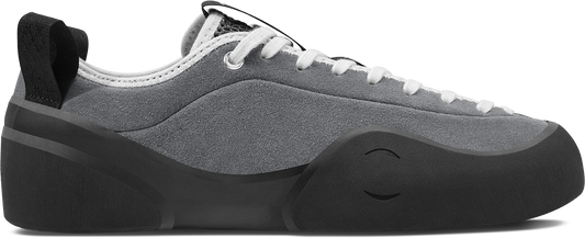 side view of grey suede climbing style skateboard shoe
