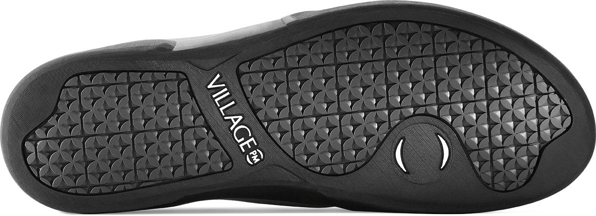 view of black rubber outsole on white background
