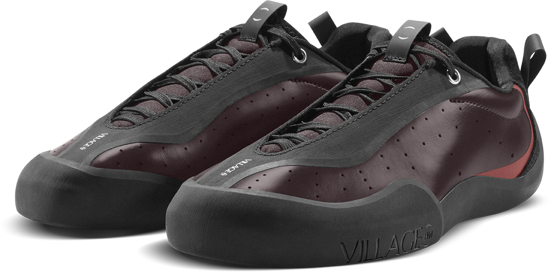 view of side by side maroon and black village PM skateboard shoe