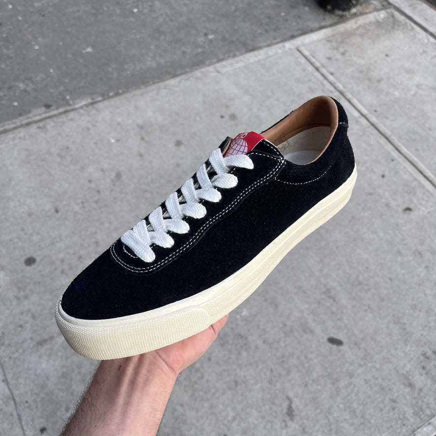 Black and white low cut suede shoes 