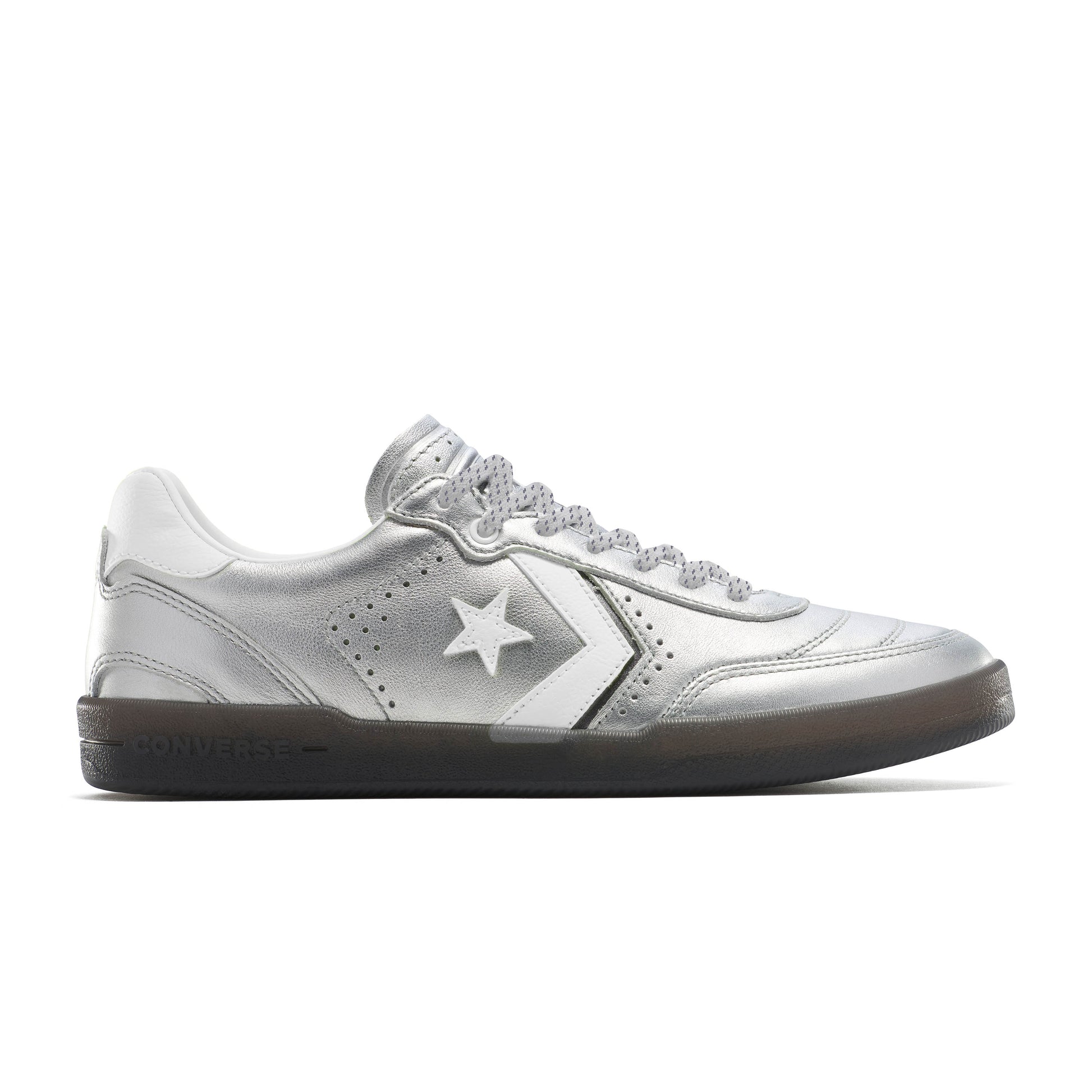 Side view of silver leather lowtop skateboard shoe with clear smoke colored sole
