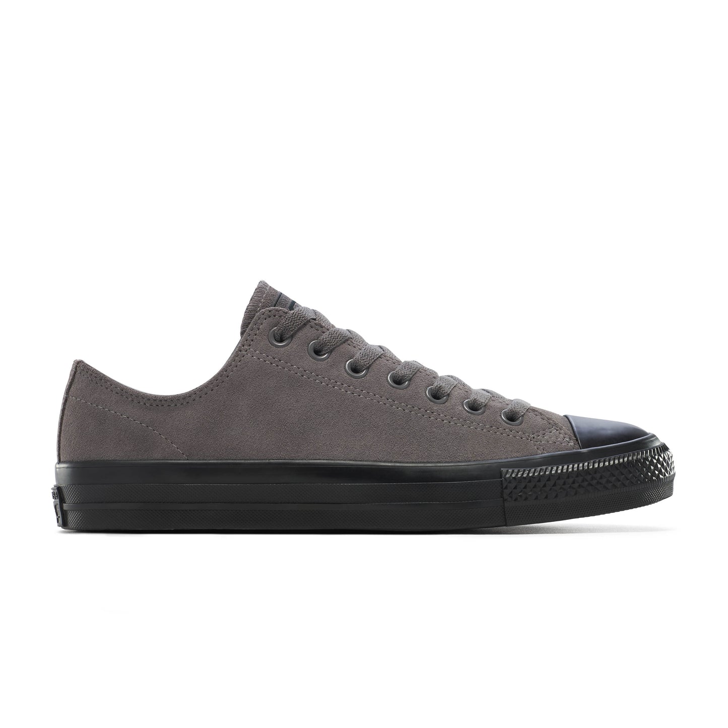 Gray sneaker with black sole on a white background