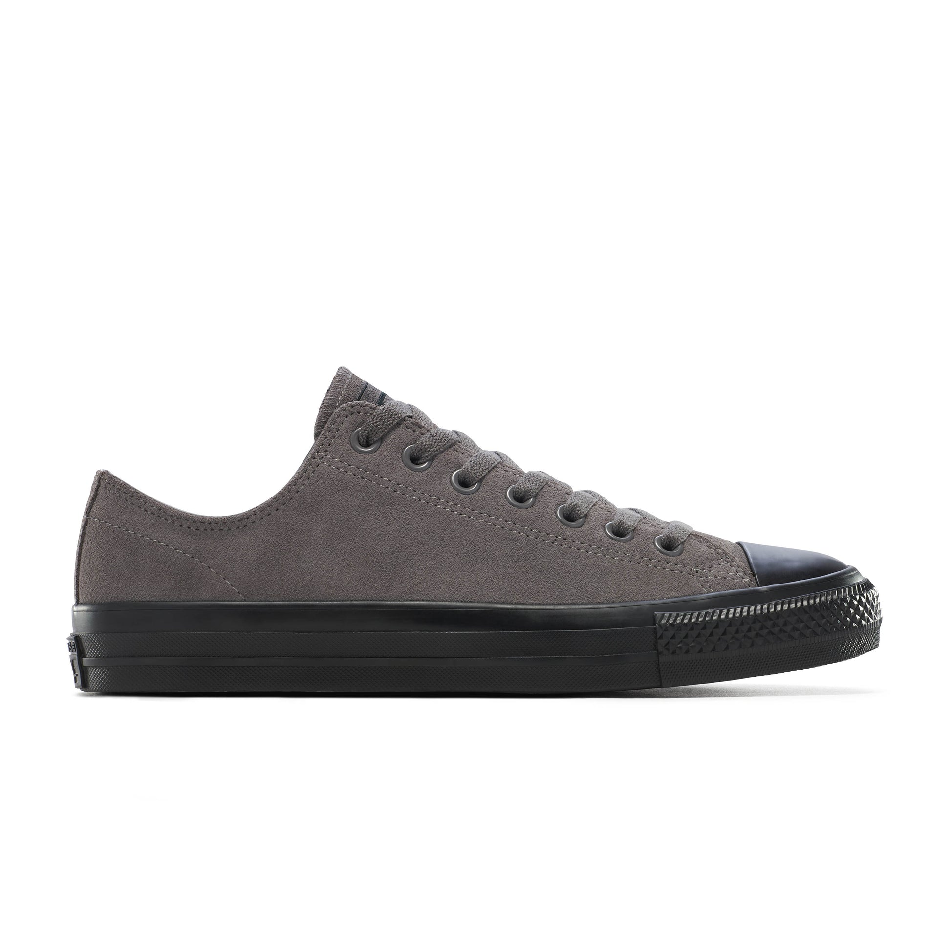 Gray sneaker with black sole on a white background