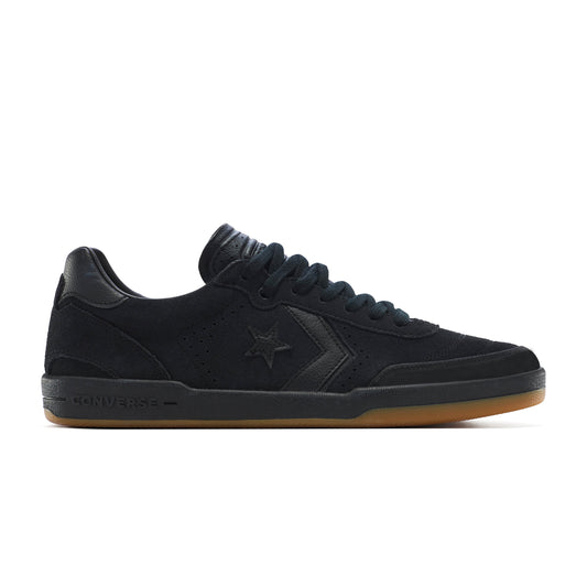 Black sneaker with brown sole on a white background