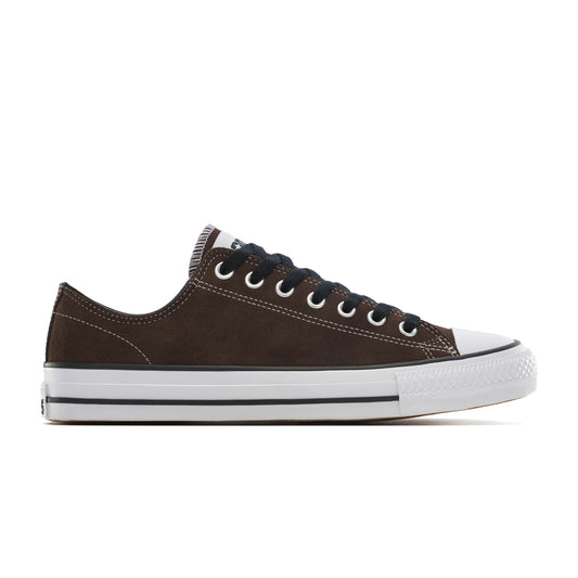 side view of brown suede low top skateboard shoe with white sole