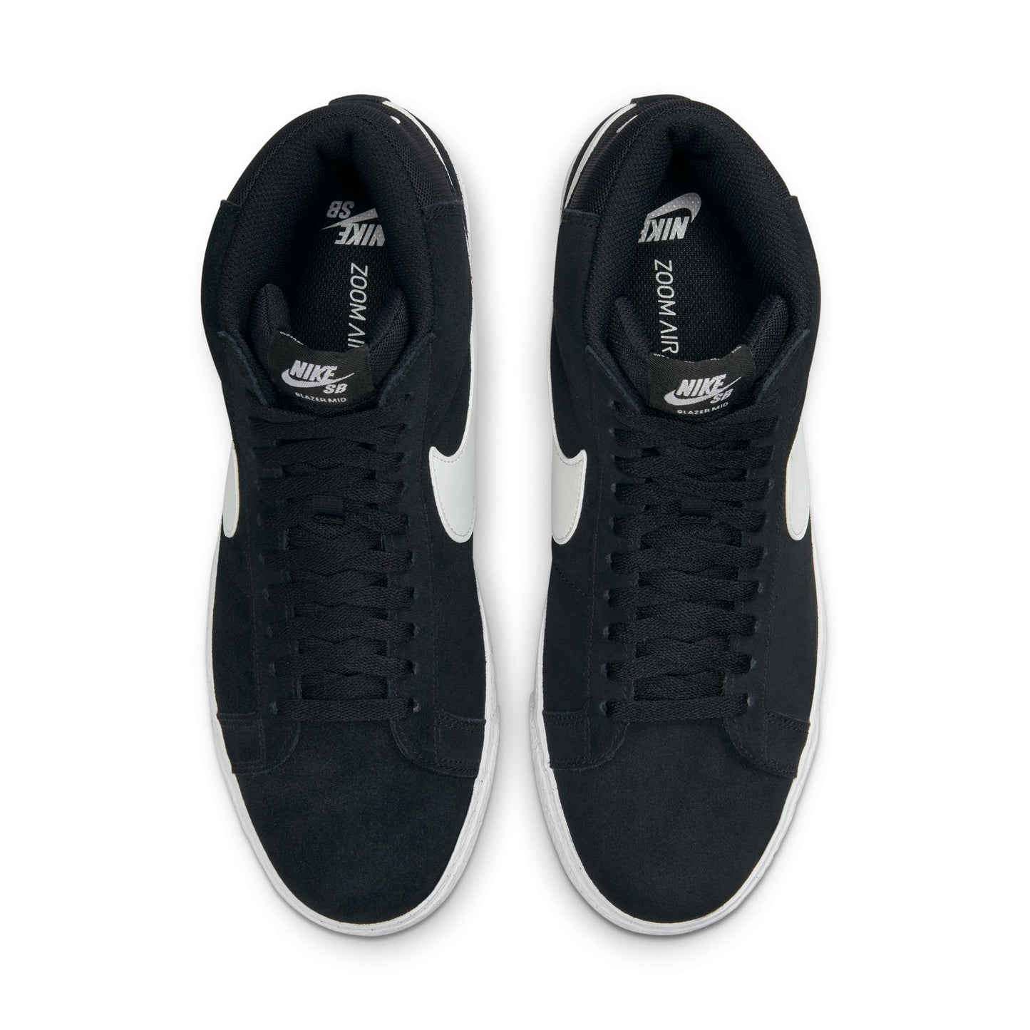 top down view of black/white suede mid top skatebaord shoe