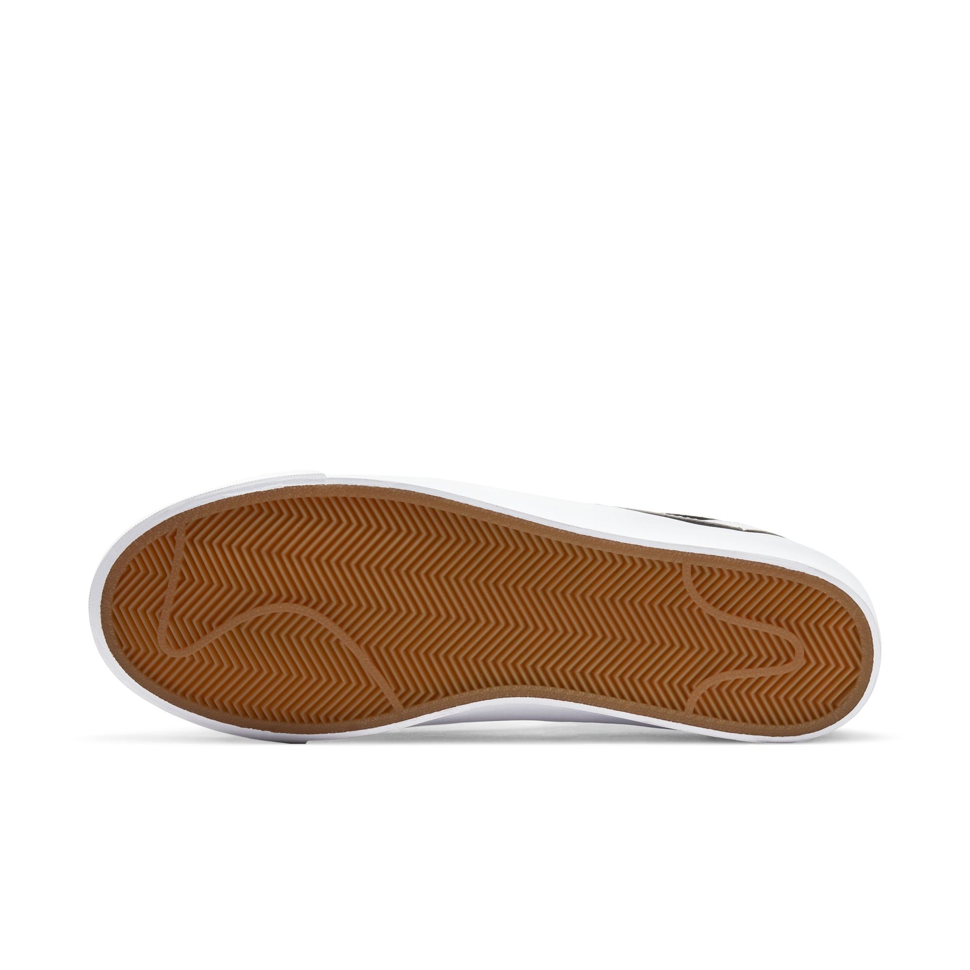 Sole of a shoe with brown rubber sole and white border on a white background