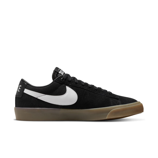 side view of black and white with gumsole sneaker