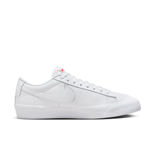 side view of white to the floor leather skateboard shoe with white sole.