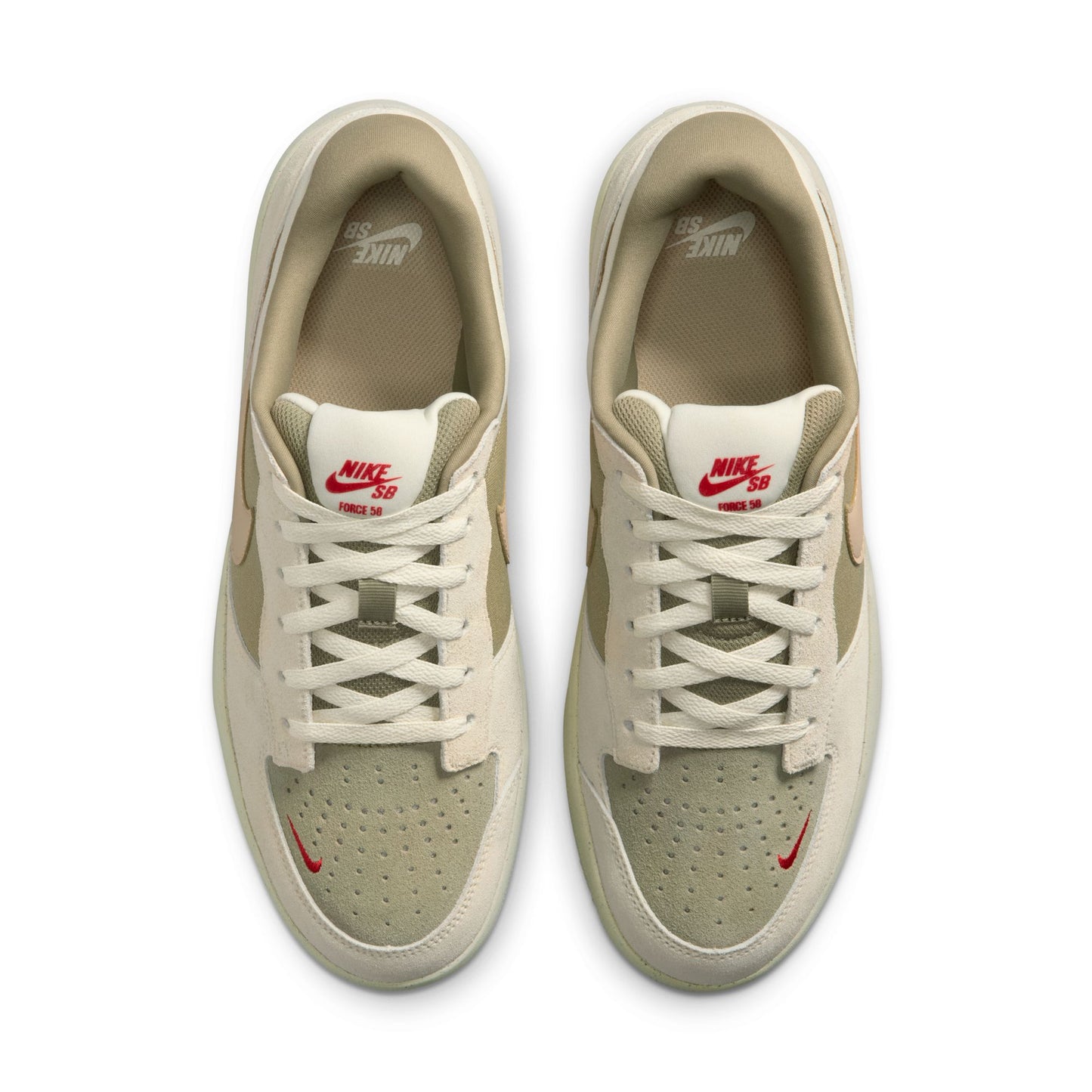 Pair of beige sneakers with red accents on a white background