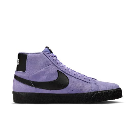 Side view of light purple mid top suede skateboard sneaker with black sole