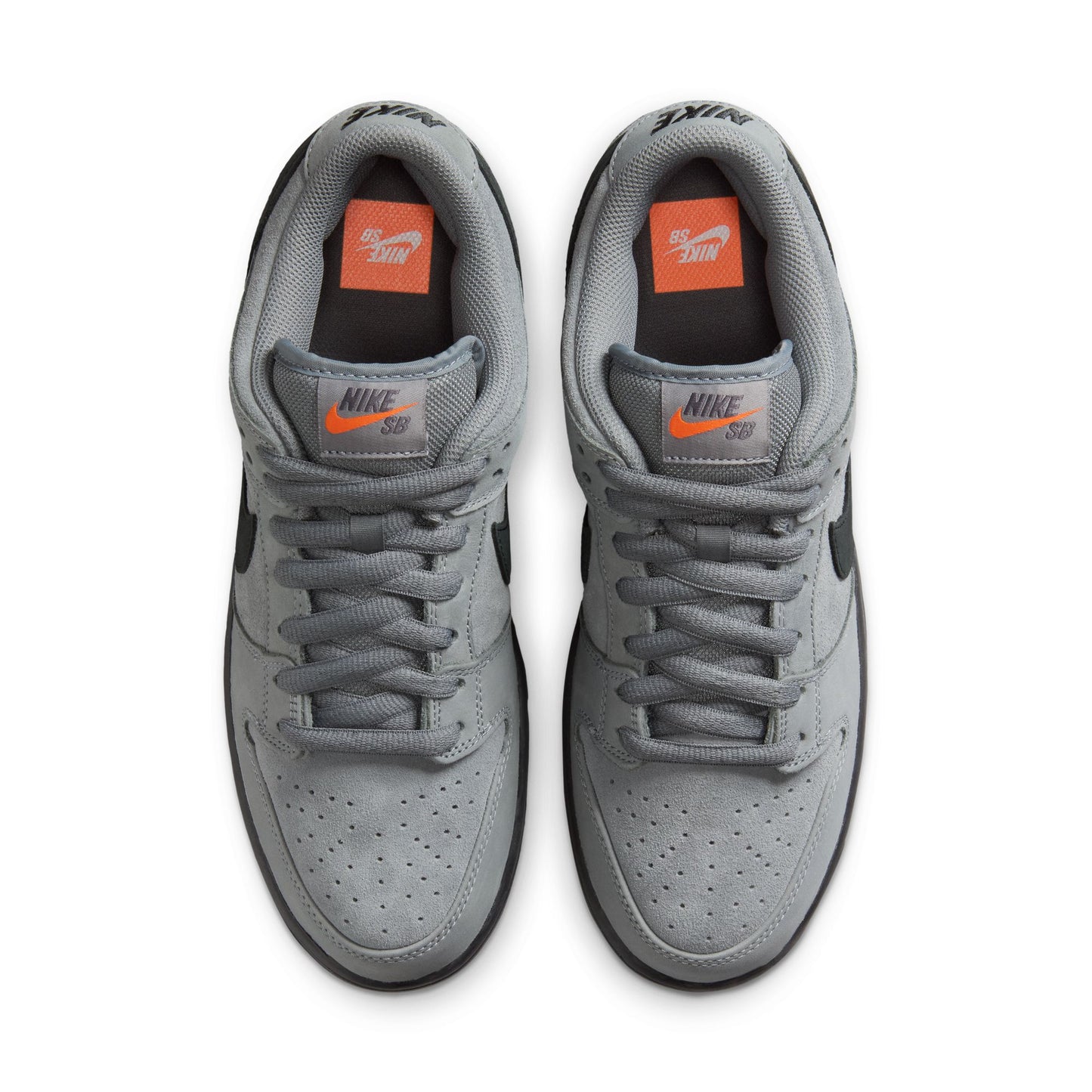 Gray sneakers with orange accents on a white background
