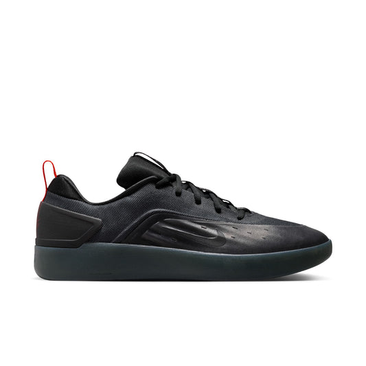 side profile view of nike sb nyjah 4 shoe in black, on a white background