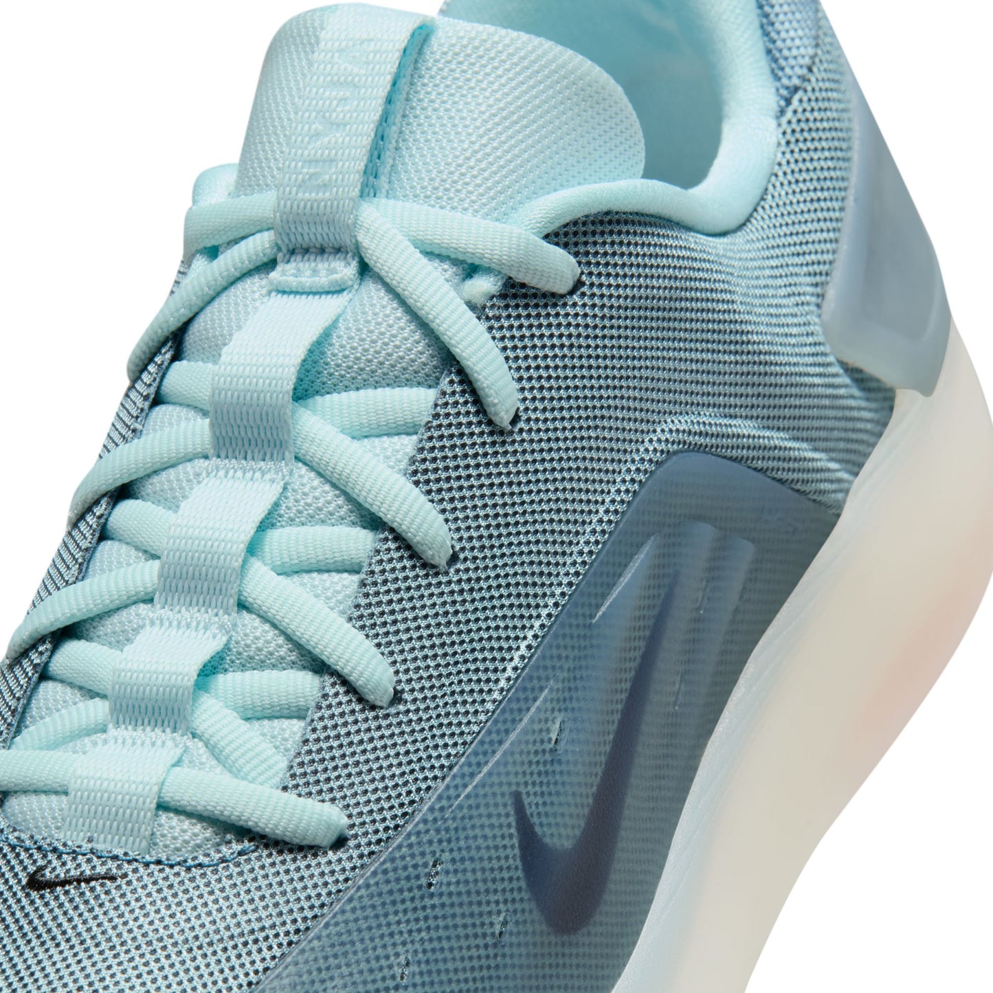 Light blue sneaker with Nike logo on a white background