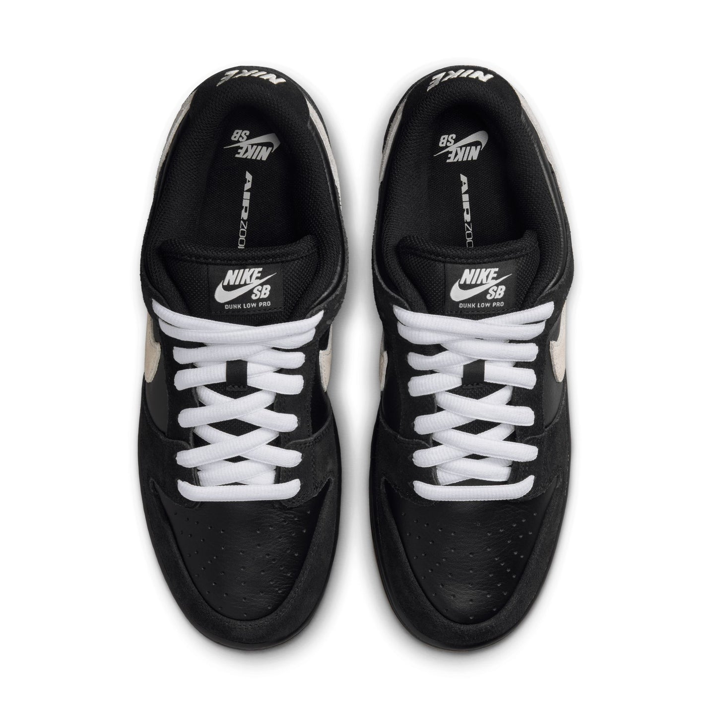 top down view of black leather and suede low top skateboard shoe with black and gum sole