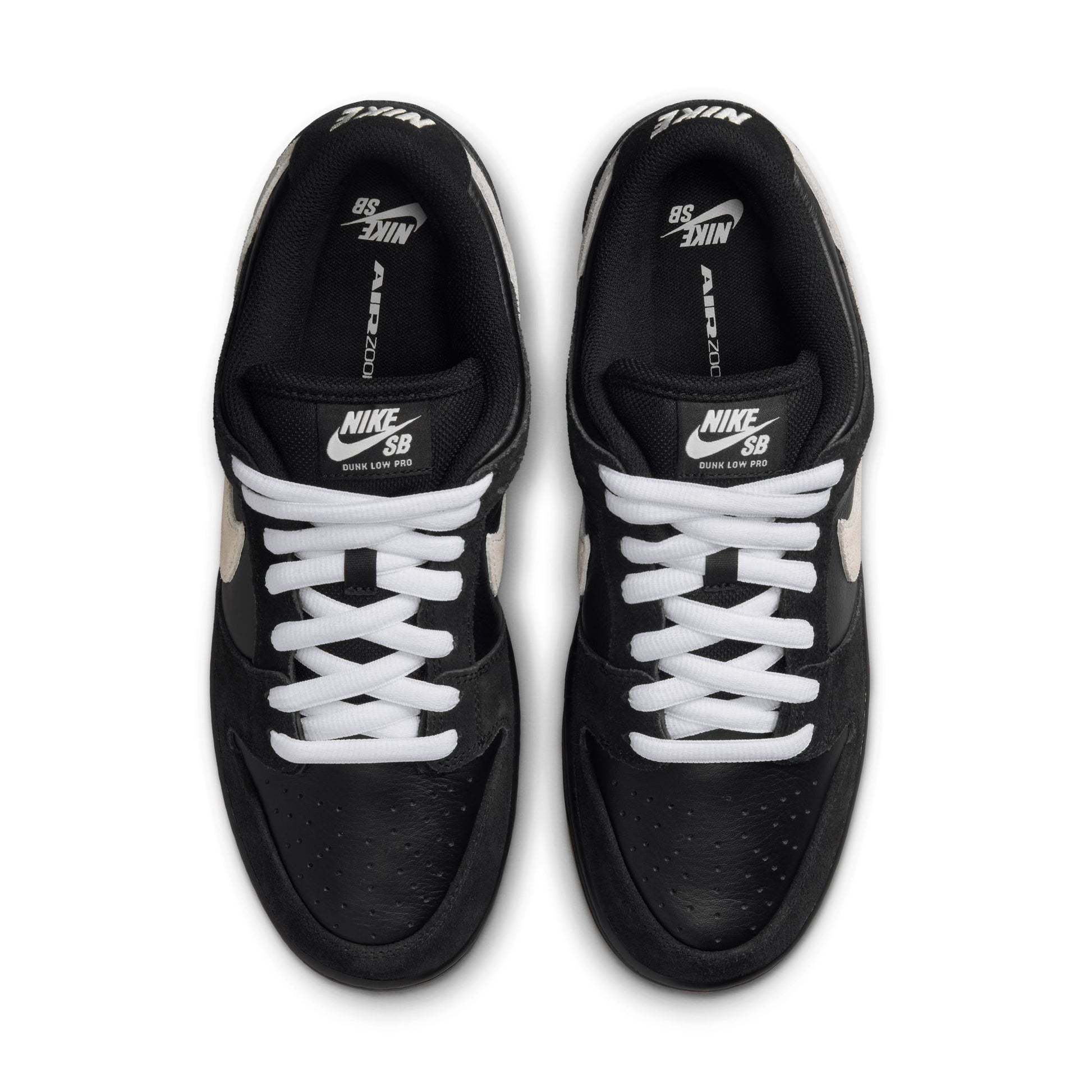 top down view of black leather and suede low top skateboard shoe with black and gum sole