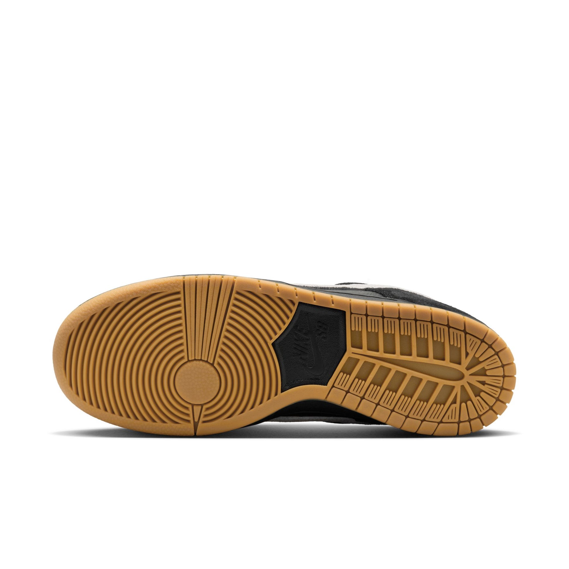 view of gum rubber outsole on lowtop skateboard shoe