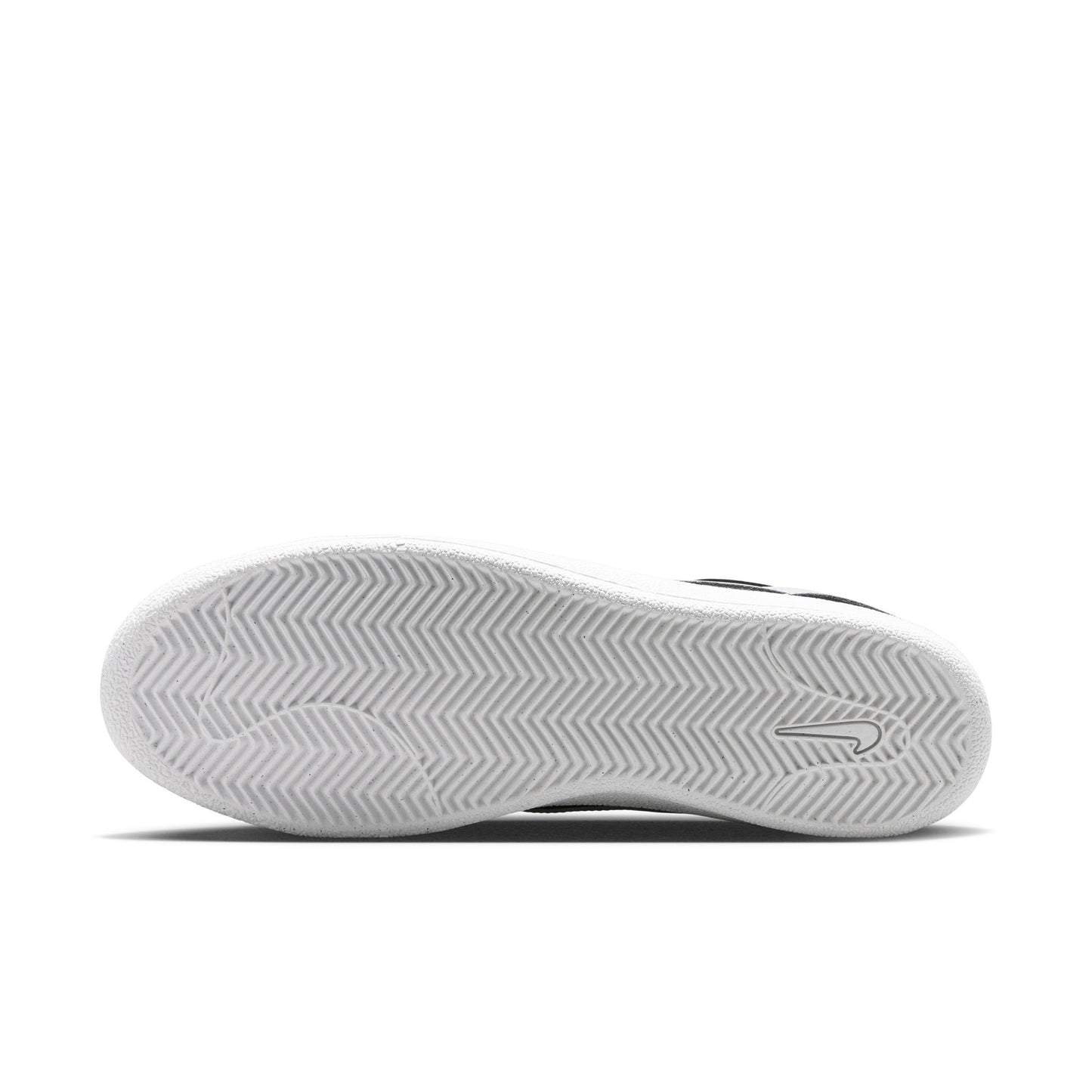 Close-up of a white nike sb sneaker sole on a white background
