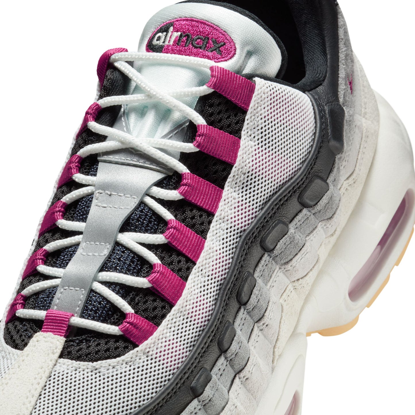 Gray and pink sneaker with 'Air Max' branding on a white background