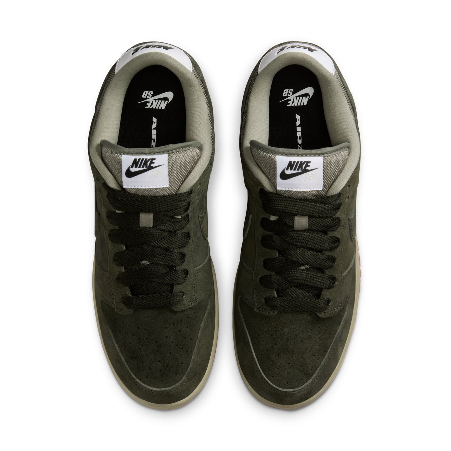 Pair of green Nike sneakers on a white background