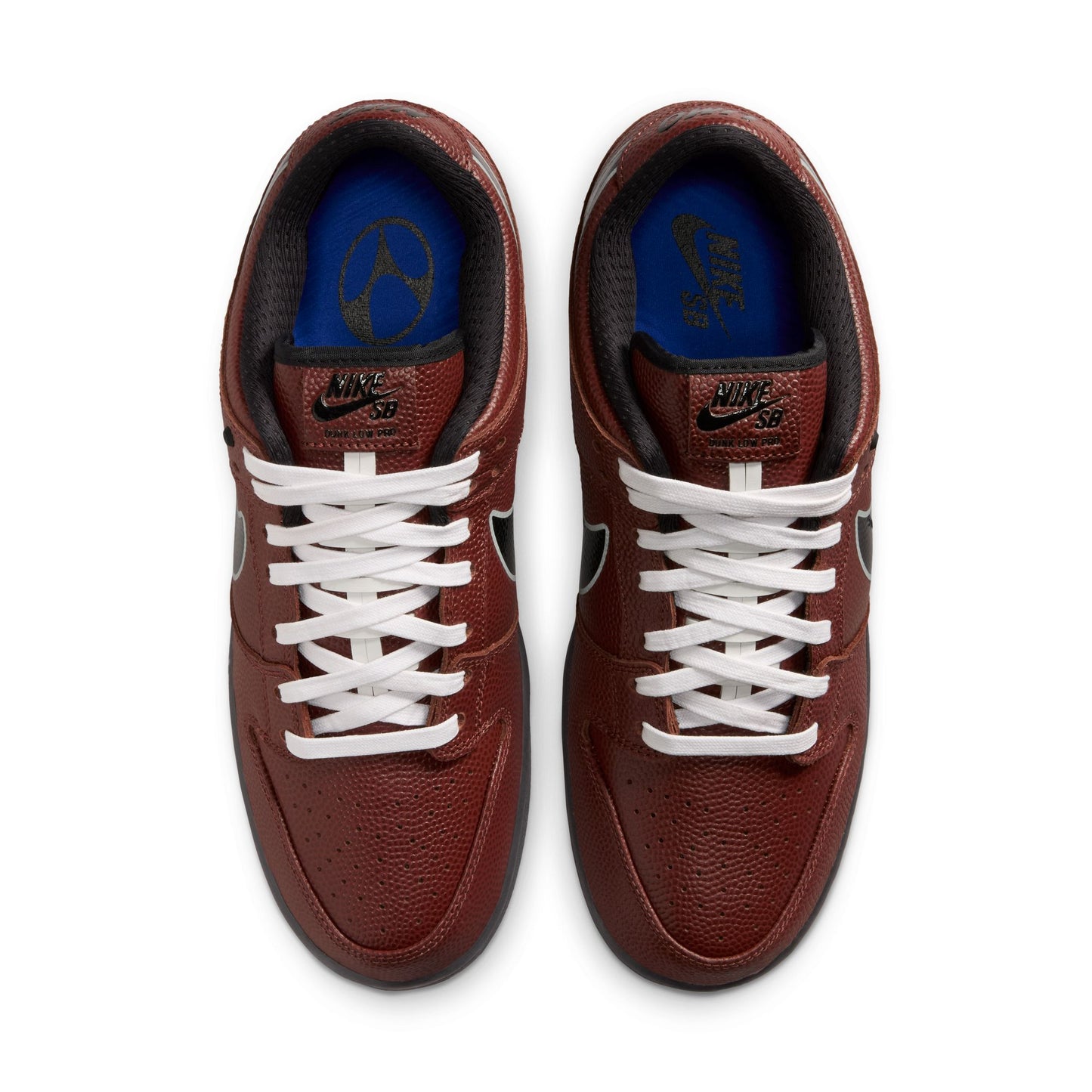 Brown sneakers with white laces on a white background