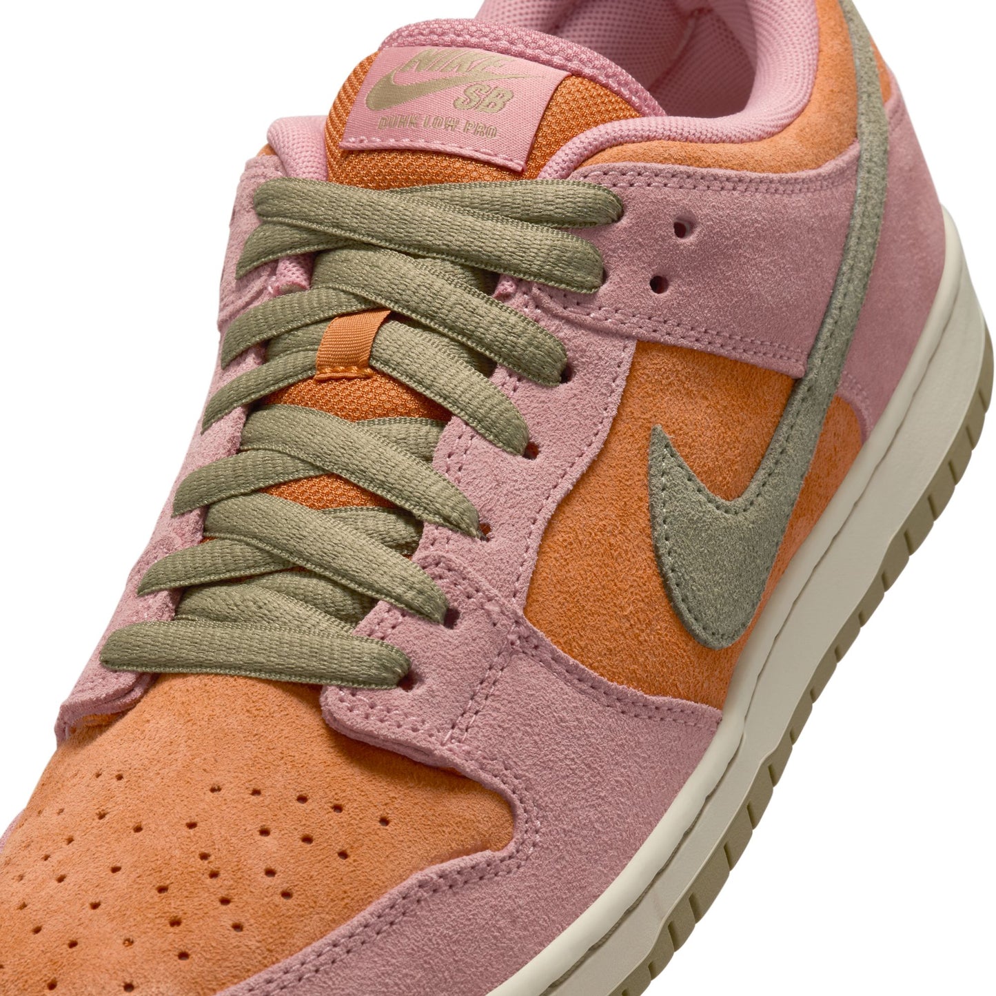 zoomed in view of multicolor suede skateboard sneaker