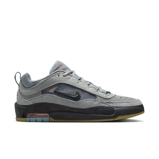 Gray sneaker with black accents on a white background