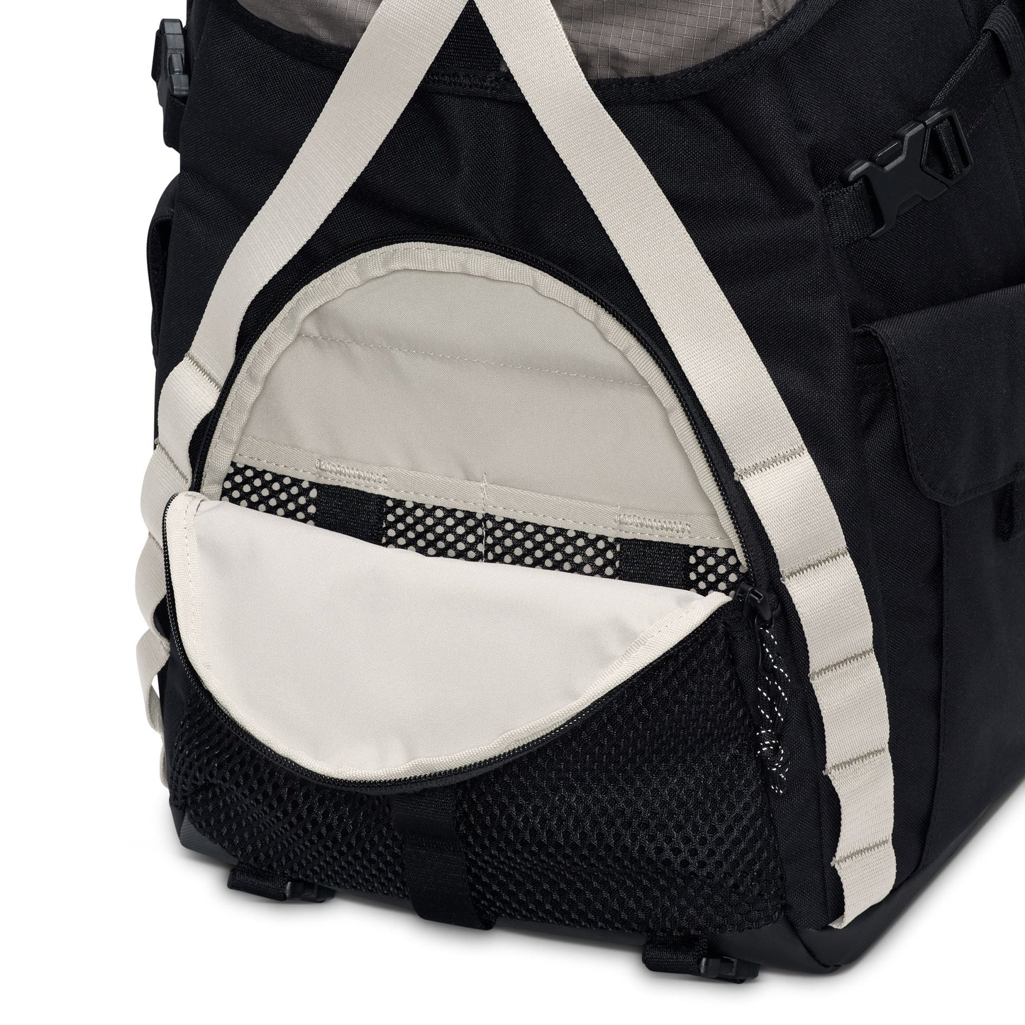close up view of Black and white bag with mesh side pocket on a white background