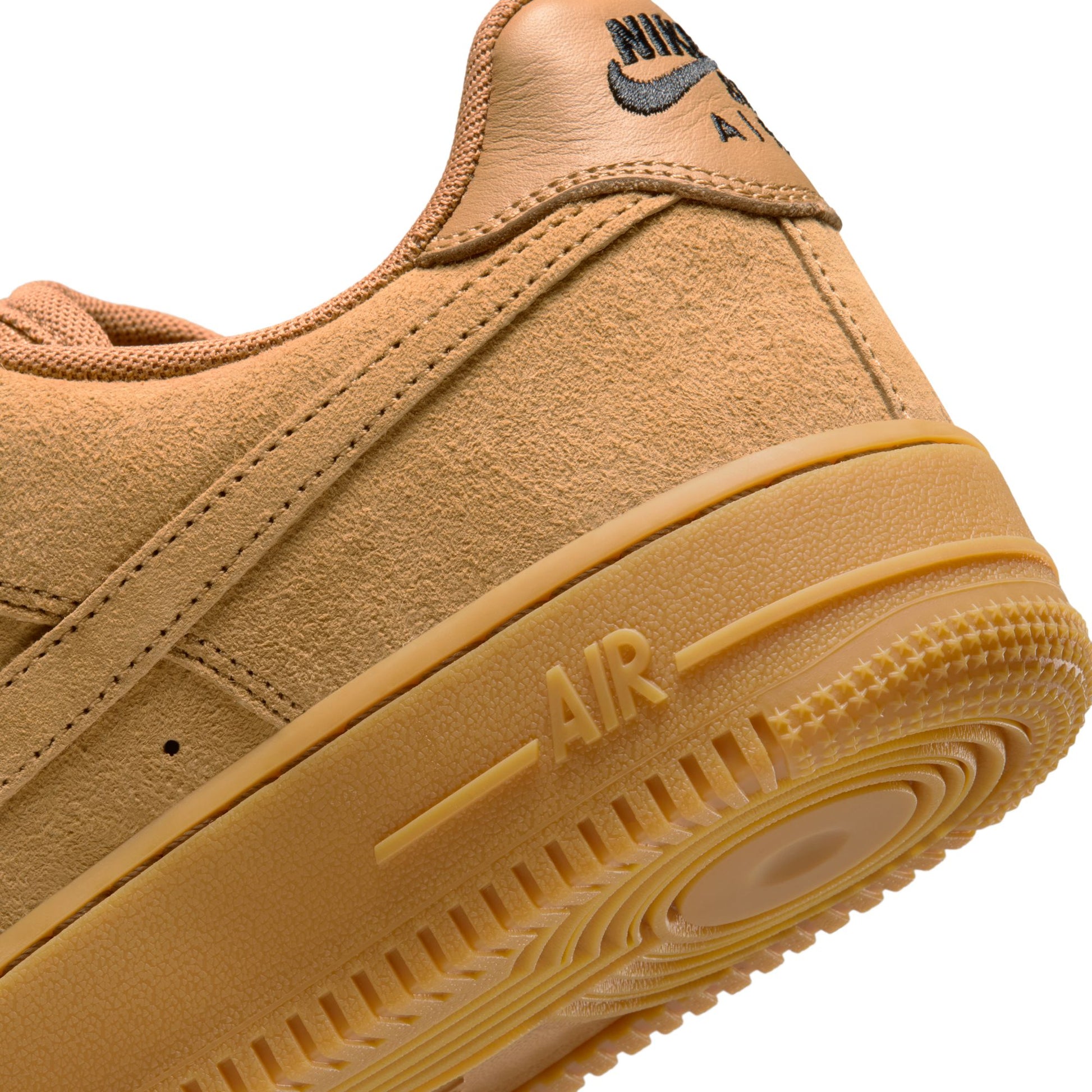 Tan sneaker with 'Air' branding on a white background