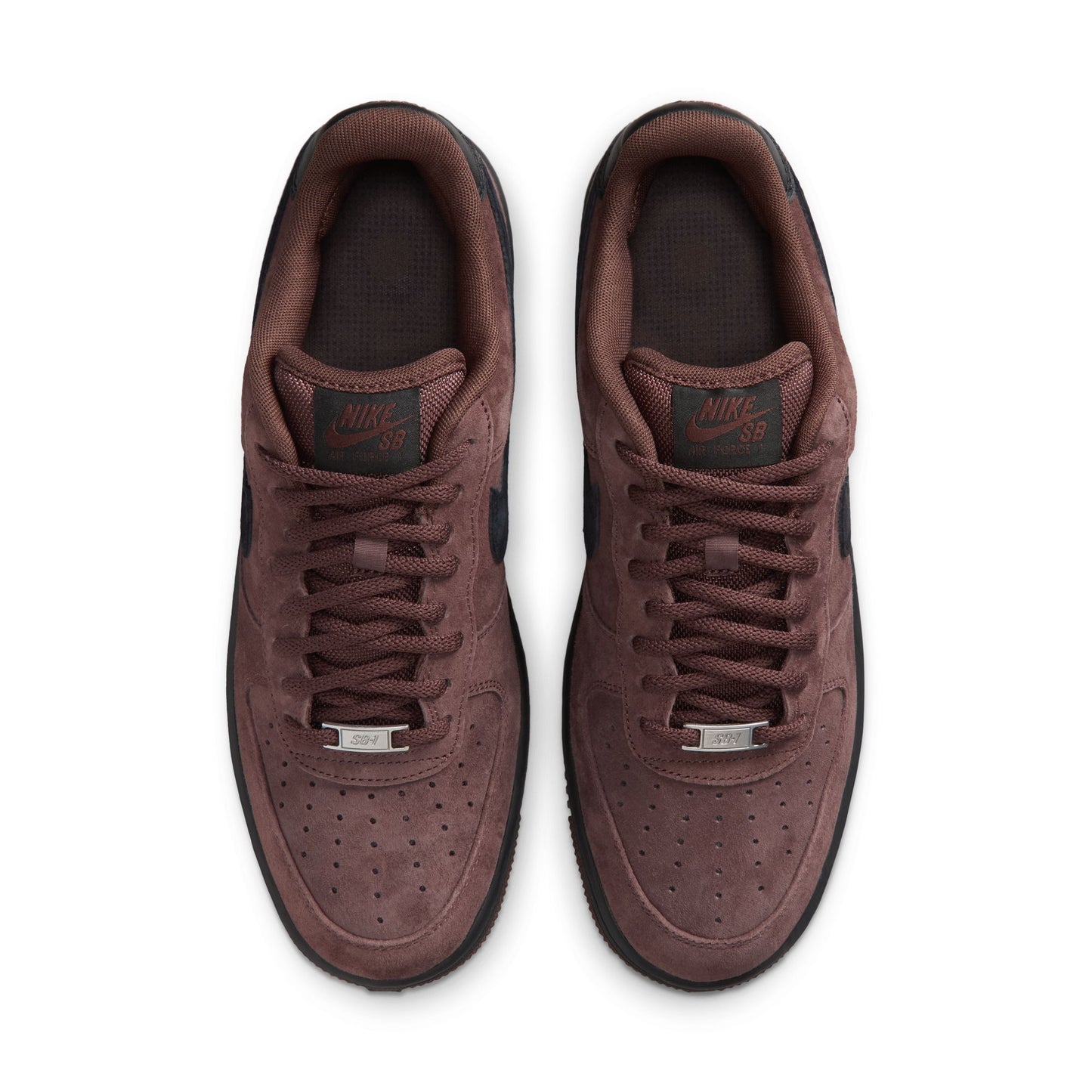 A pair of Nike Air Force 1 Low sneakers in a dark brown suede and leather mix, shown from a top-down view on a white background.