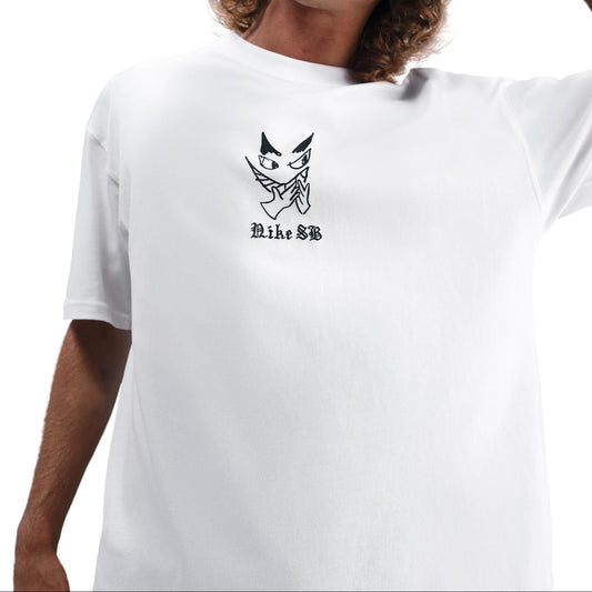 Person wearing a white t-shirt with a logo and text, standing against a white background