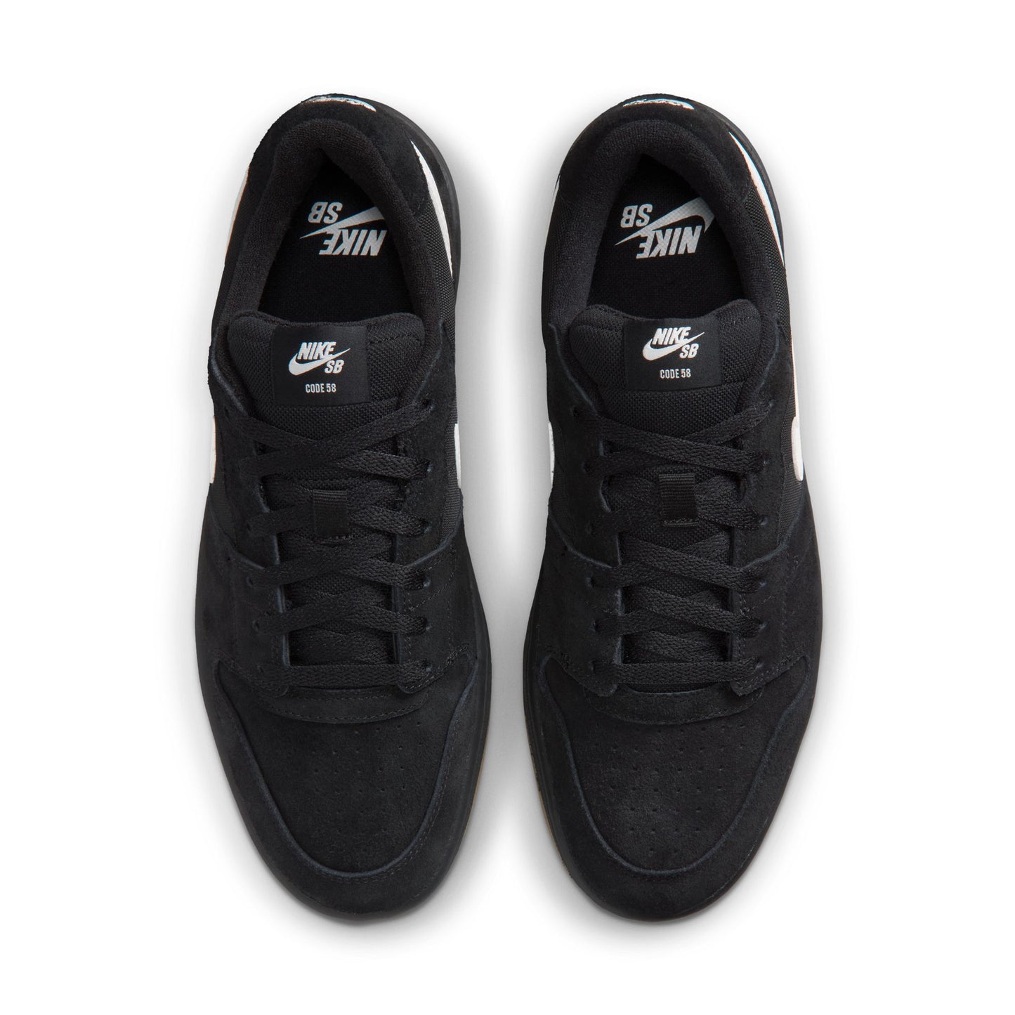 Pair of black Nike sneakers on a white background