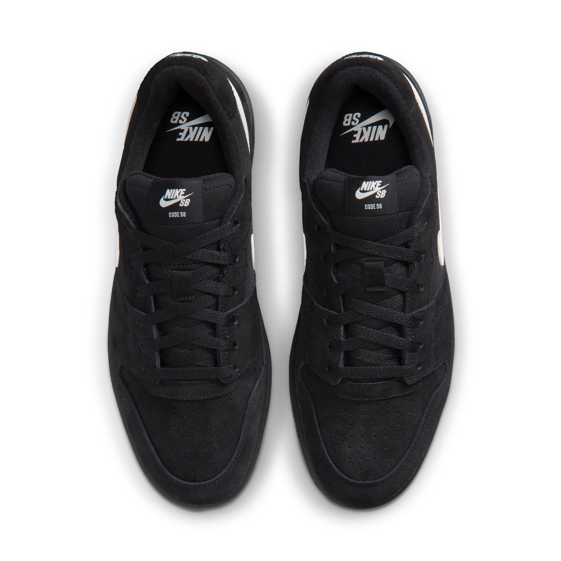 Pair of black Nike sneakers on a white background
