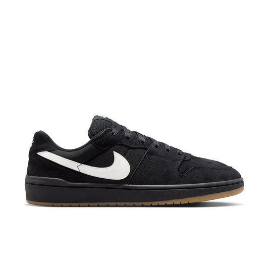 Black Nike sneaker with white swoosh logo on a white background