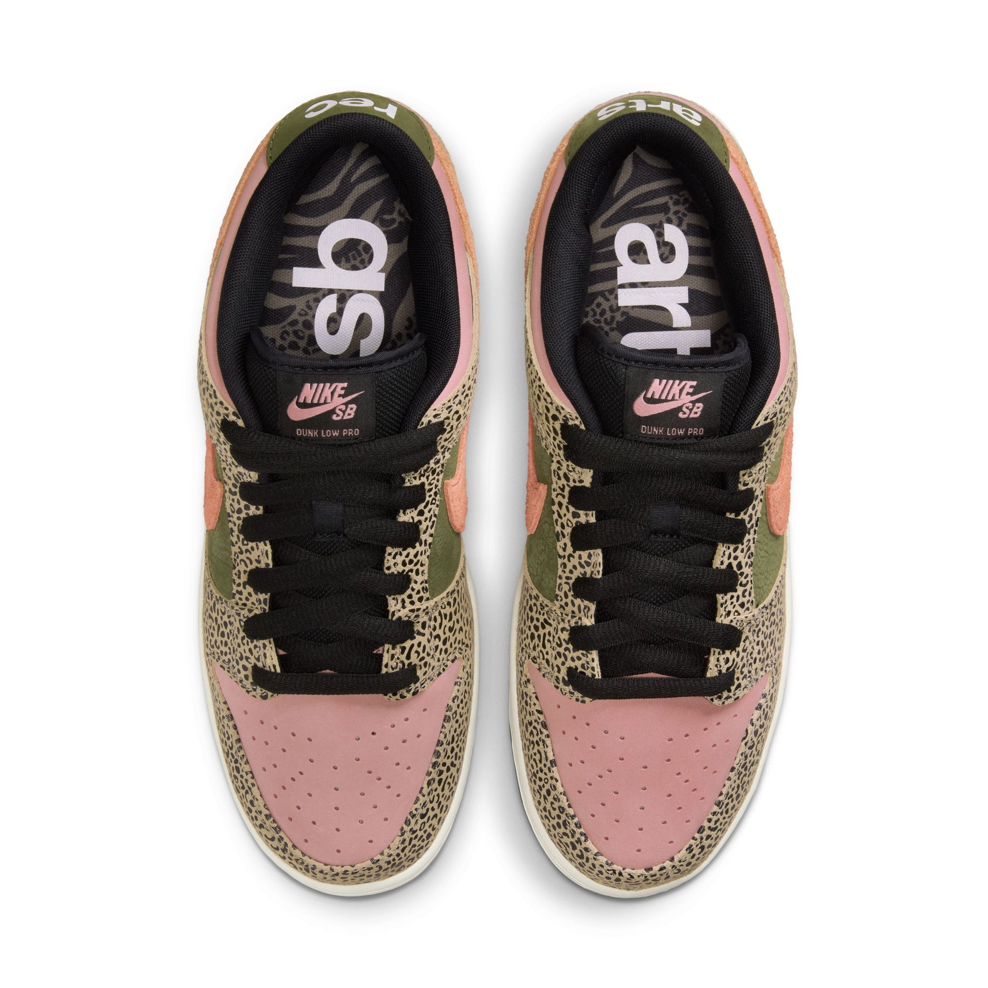 Pair of Nike sneakers with pink and green pattern on a white background