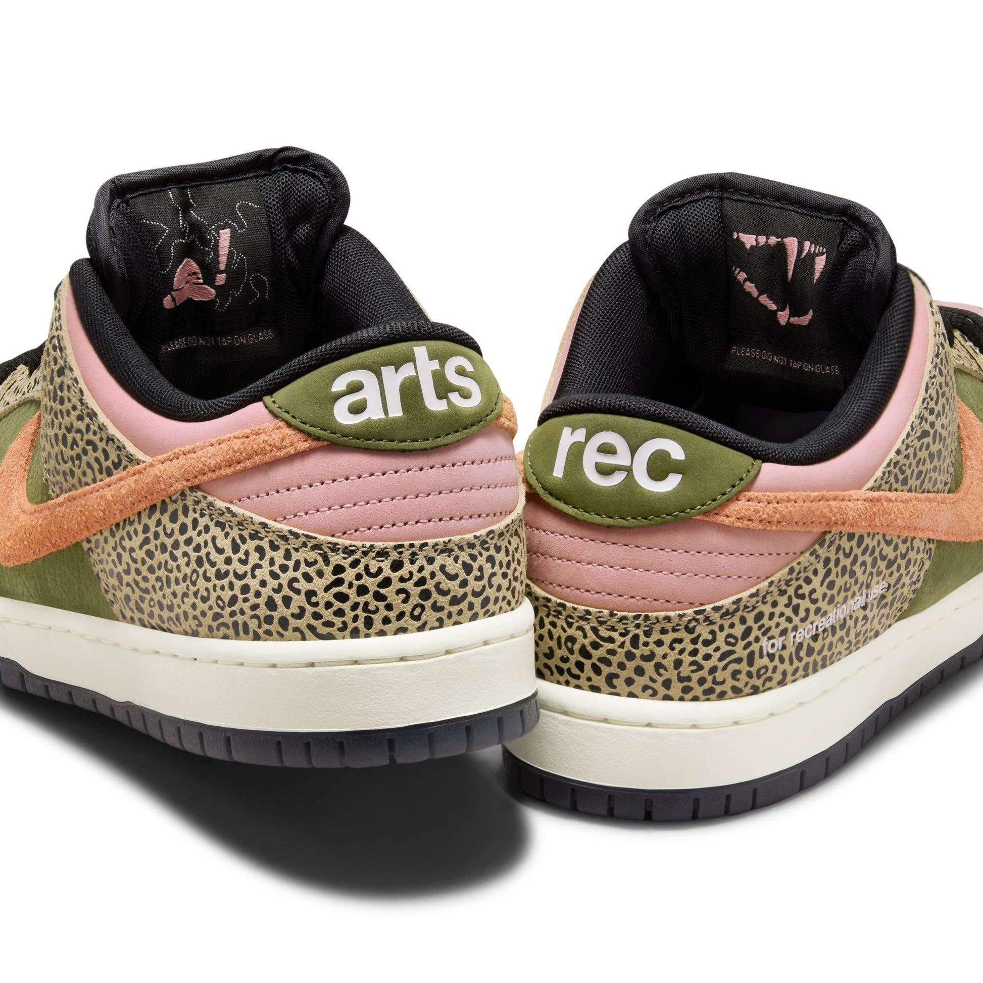 Pair of sneakers with 'arts' and 'rec' labels on a white background