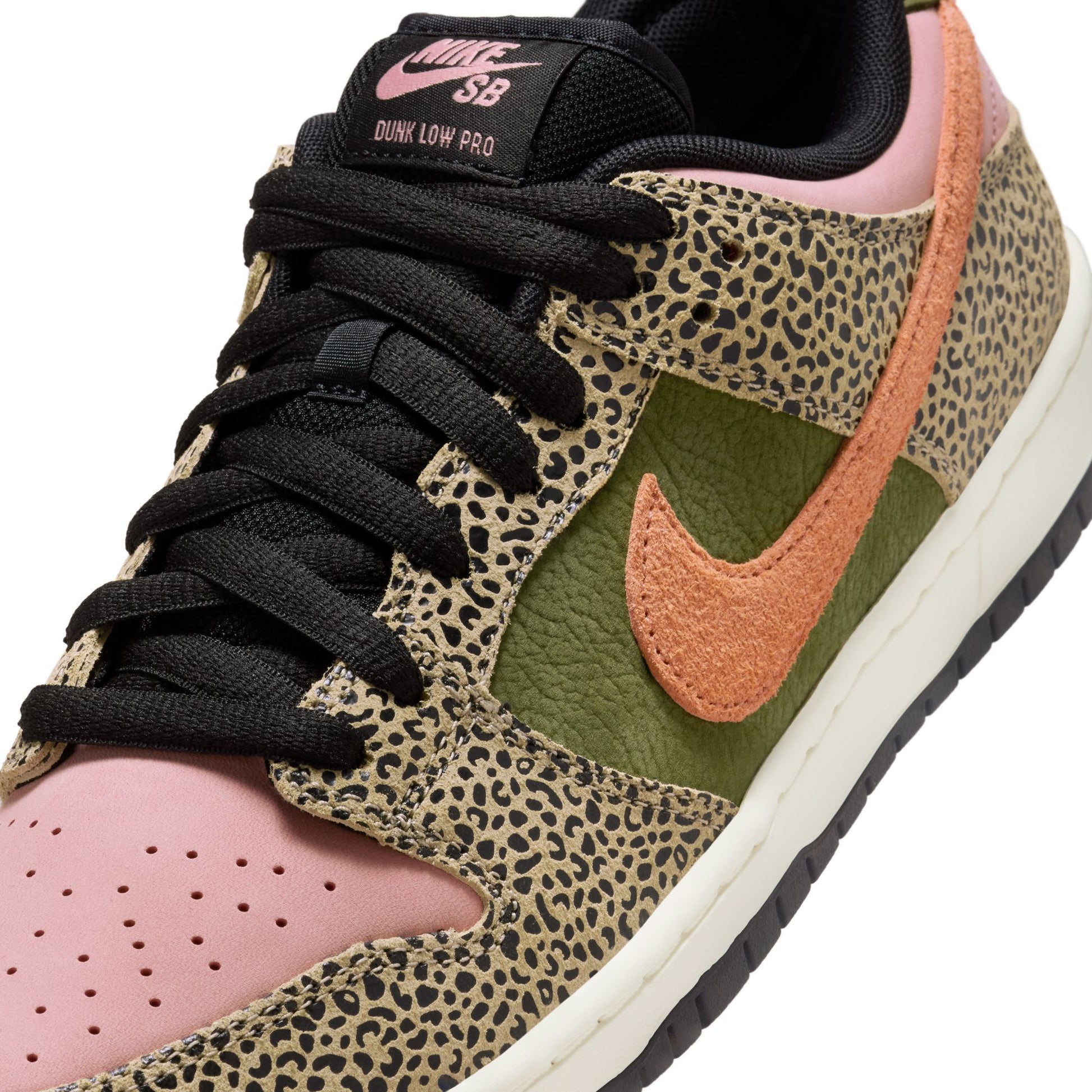 Nike SB Dunk Low Pro sneaker with leopard print and pink accents on a white background