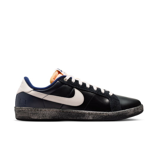 Black sneaker with a visible NIKE swoosh brand logo on a white background