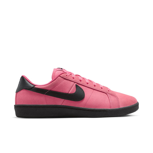 Pink sneaker with black swoosh logo on a white background