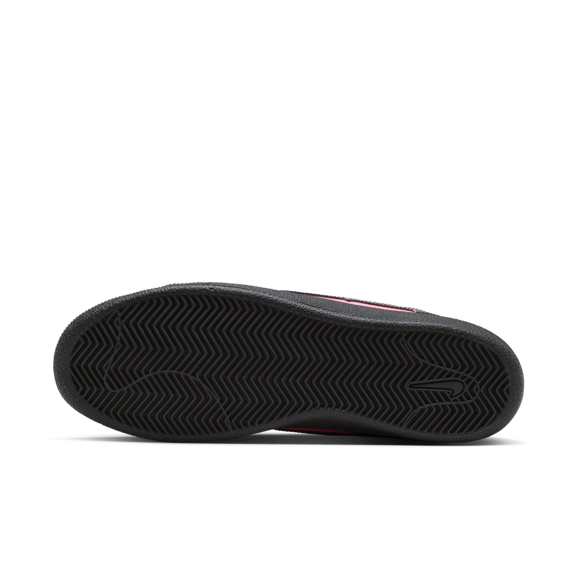 Black textured shoe sole on a white background