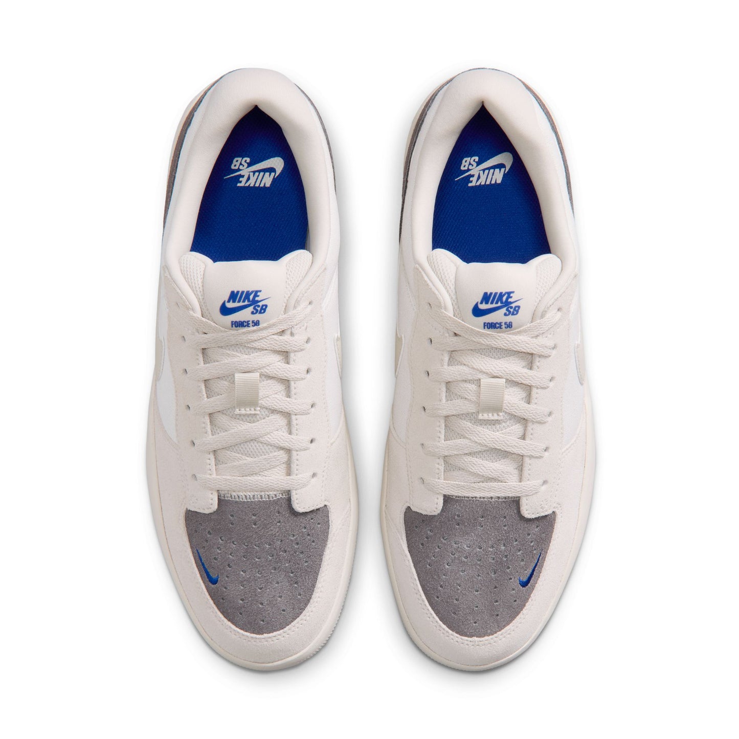 White sneakers with gray soles and blue swoosh logo on a white background