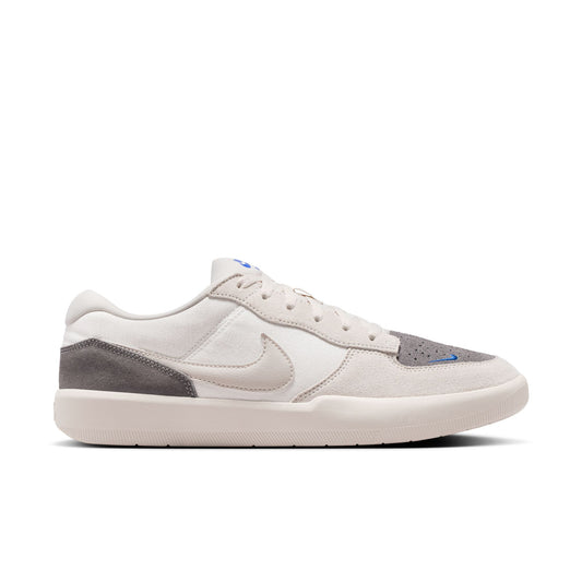 White sneaker with gray accents on a white background