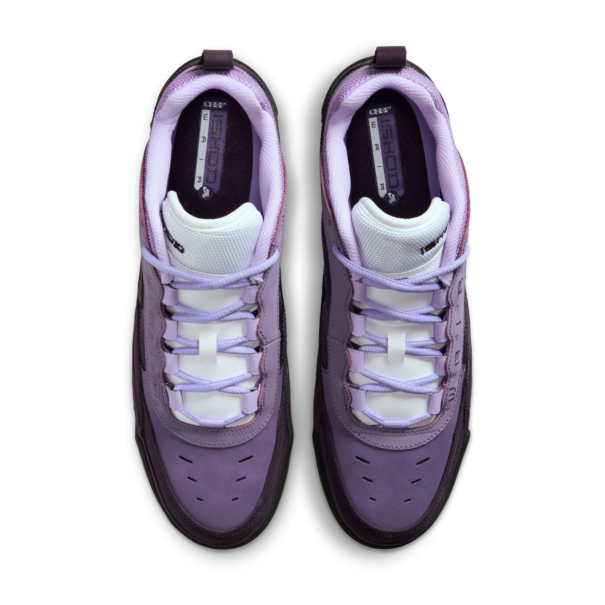 overhead view of Purple and white sneakers on a white background