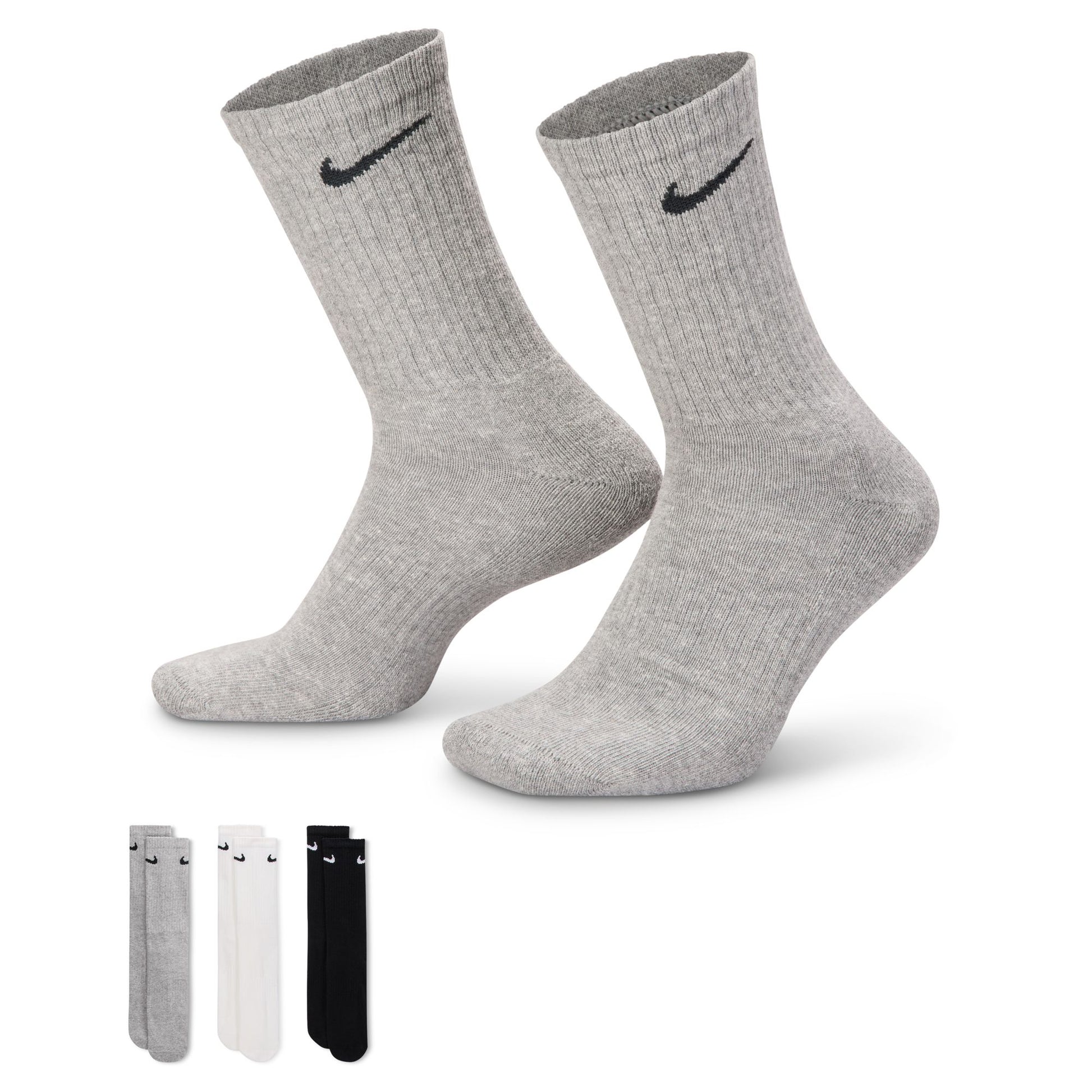  pairs of gray, white and black socks with Nike logo on a white background