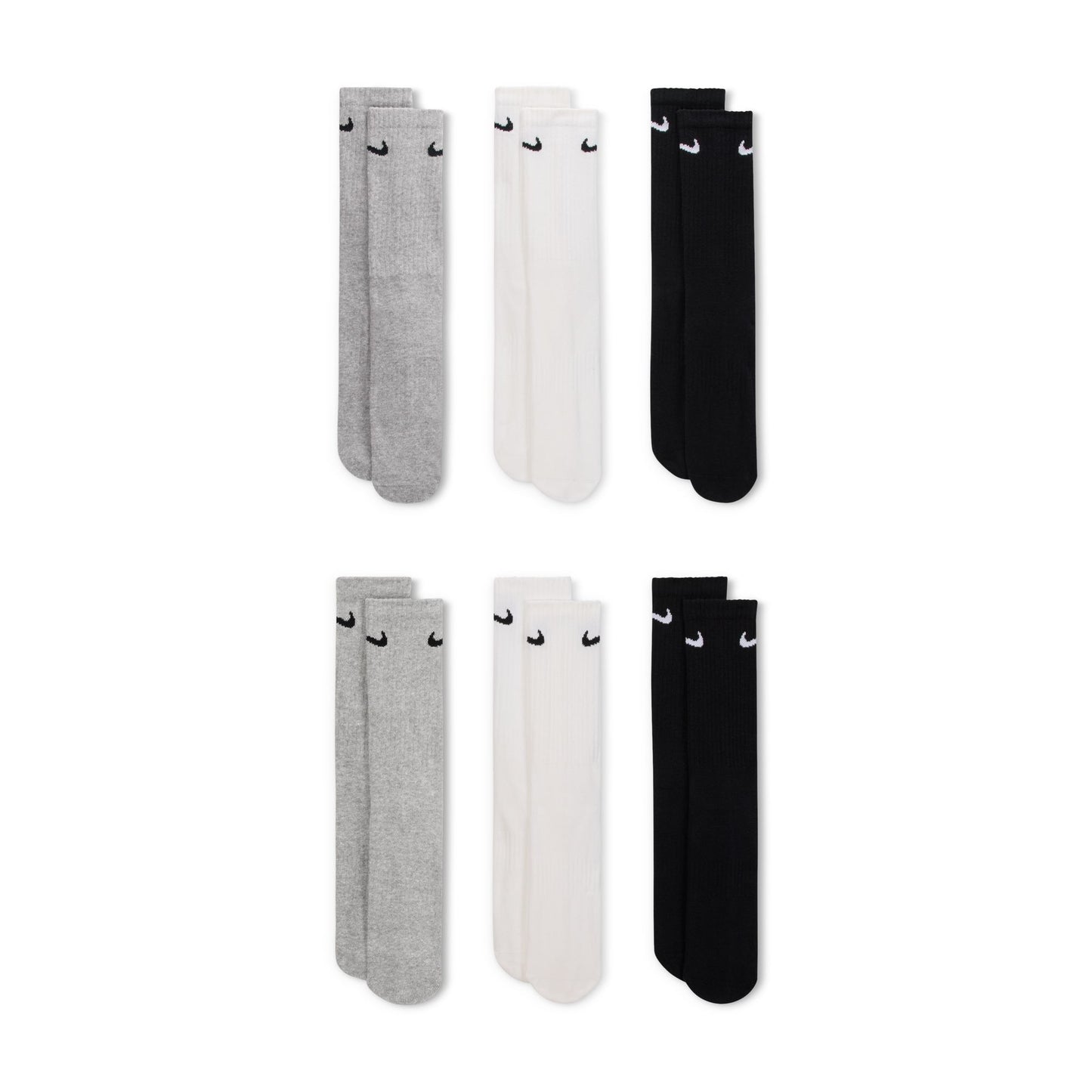 Set of gray, white, and black socks with Nike logo on a white background