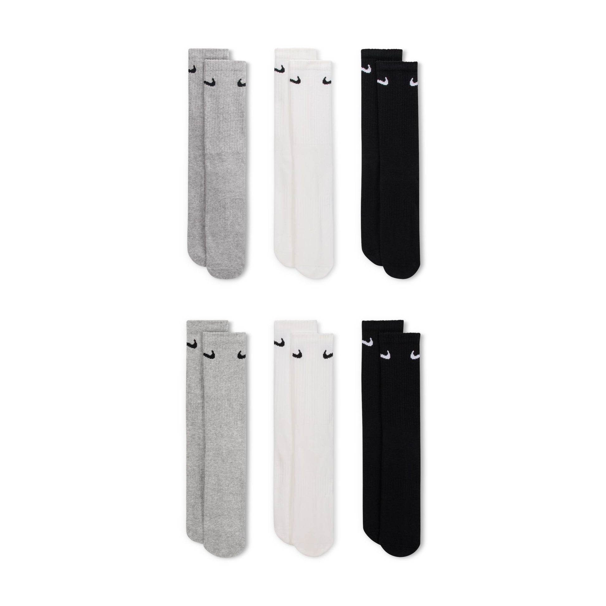Set of gray, white, and black socks with Nike logo on a white background