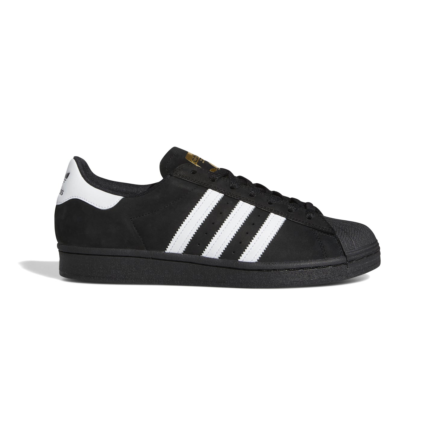 side view of black nubuck adidas superstar shoe with white stripes