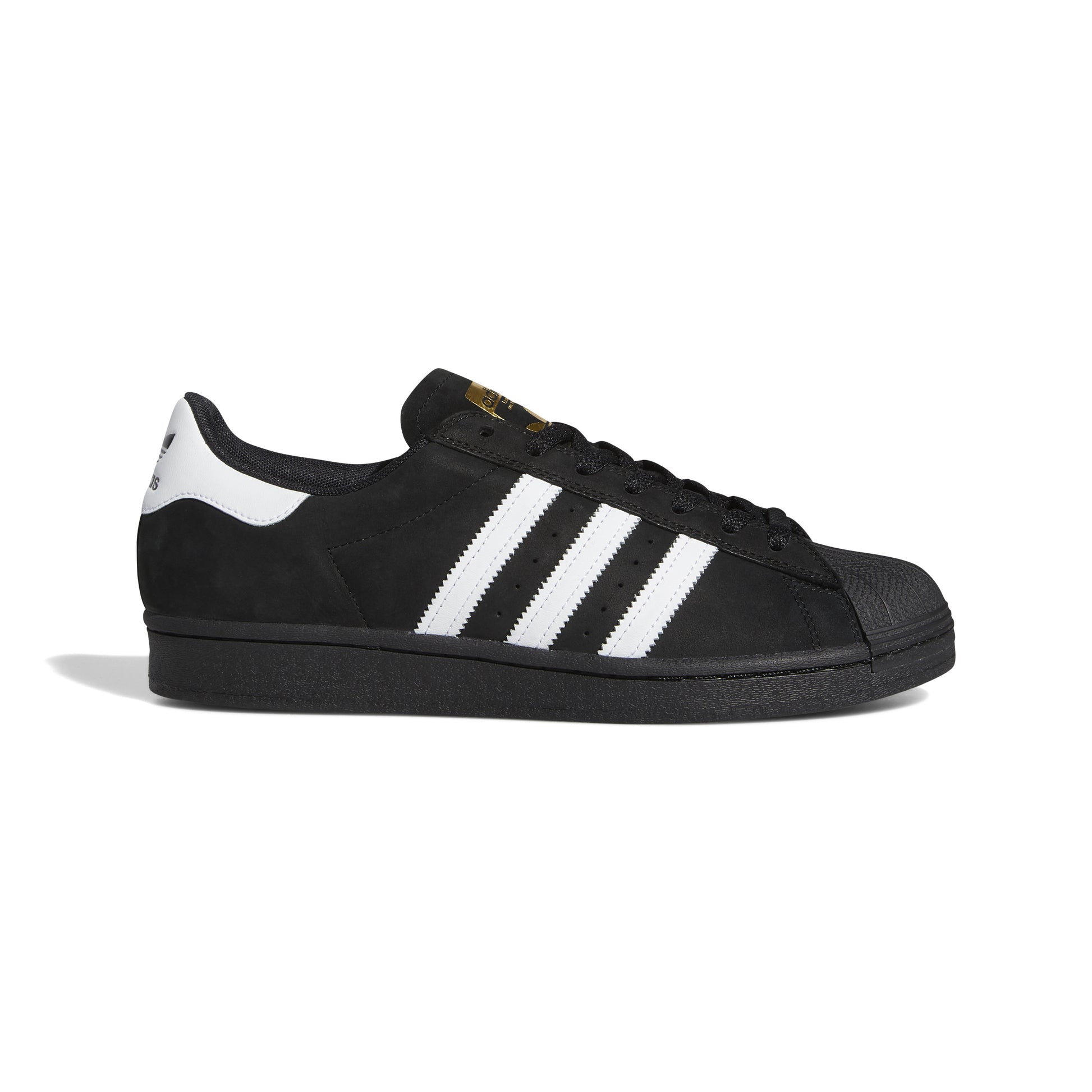 side view of black nubuck adidas superstar shoe with white stripes