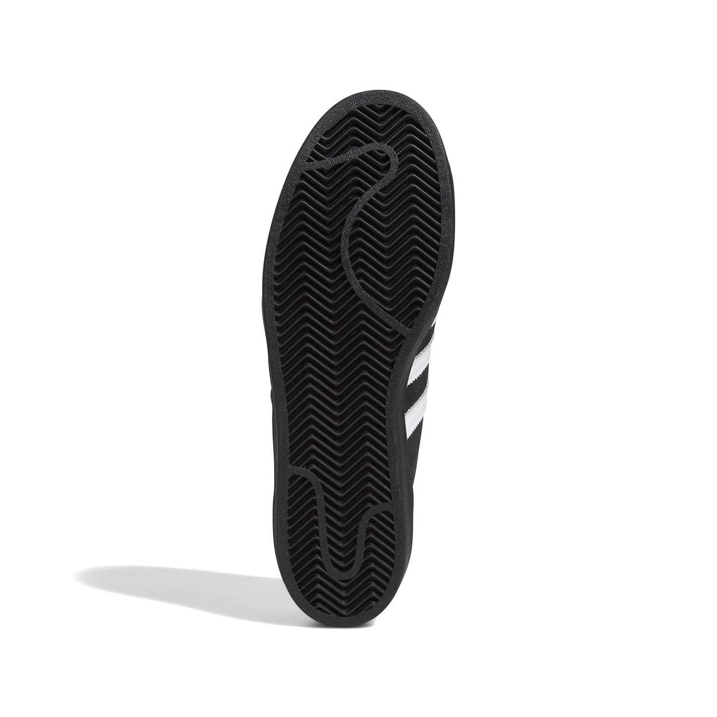 view of black rubber outsole on adidas superstar shoe